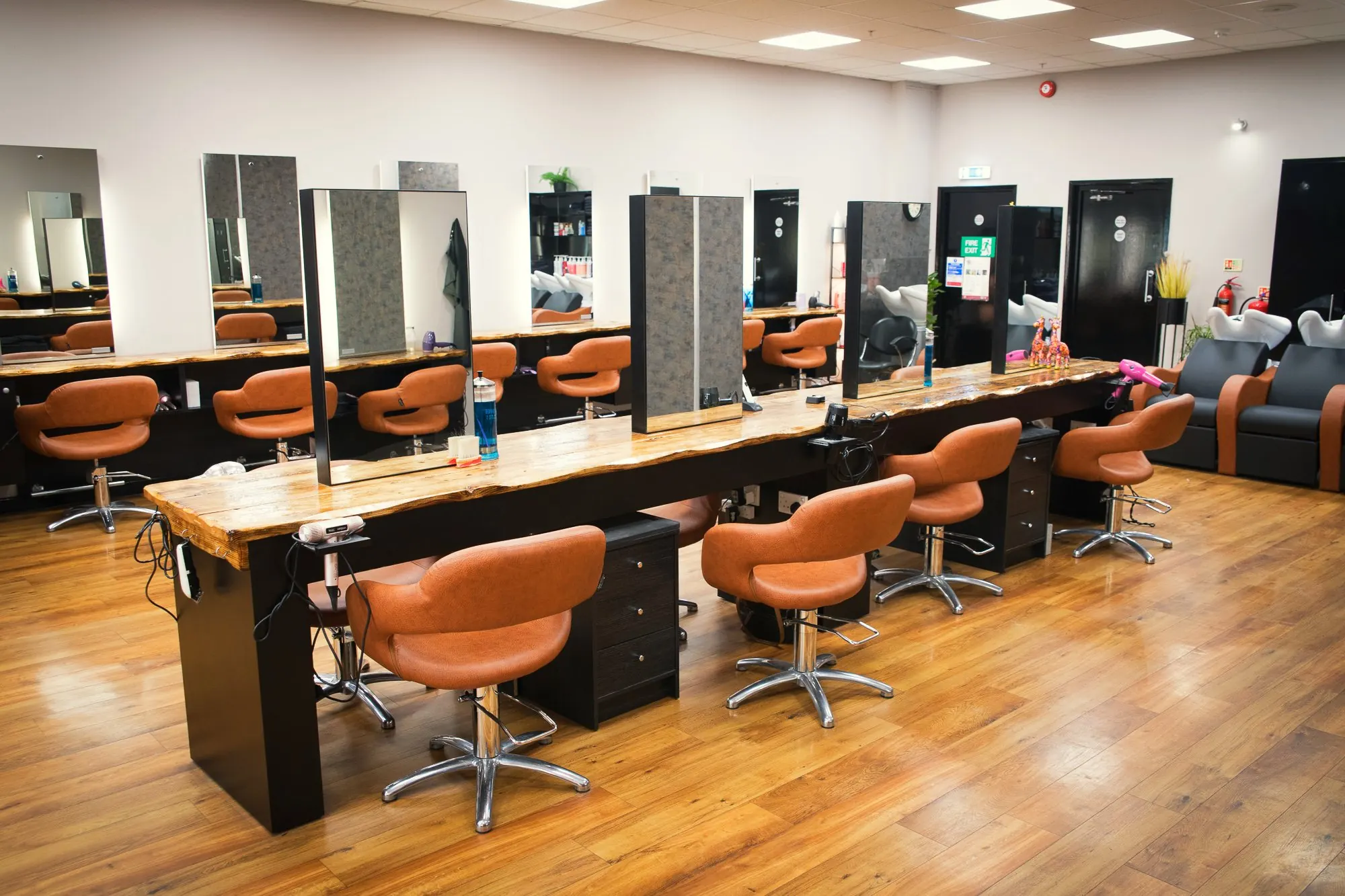 New styling chairs and the live-edge workstation counter at Deesigner Hair Studio, Ipswich