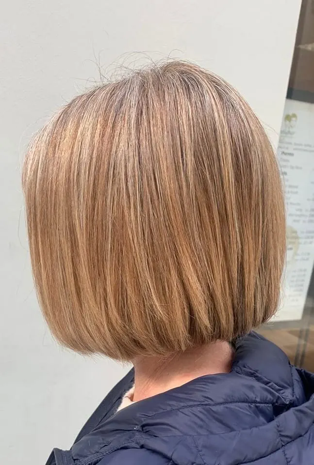 Un fondu doux de chocolat, doré et blond, coupe et brushing, réalisé chez Deesigner Hair Studio, Ipswich, par Emma